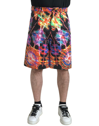 Multicolor printed cotton men's Bermuda shorts by Dolce & Gabbana, featuring vibrant patterns and comfortable fit.