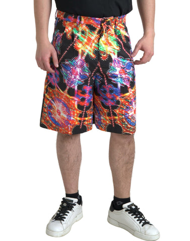 Multicolor printed cotton Bermuda shorts for men by Dolce & Gabbana, featuring vibrant patterns and a comfortable fit.