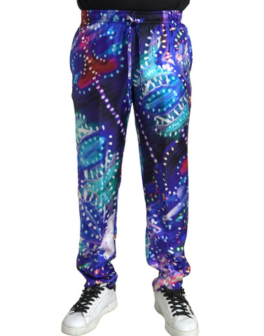 Multicolor printed silk men's trouser pants by Dolce & Gabbana, featuring vibrant patterns and a tailored fit.