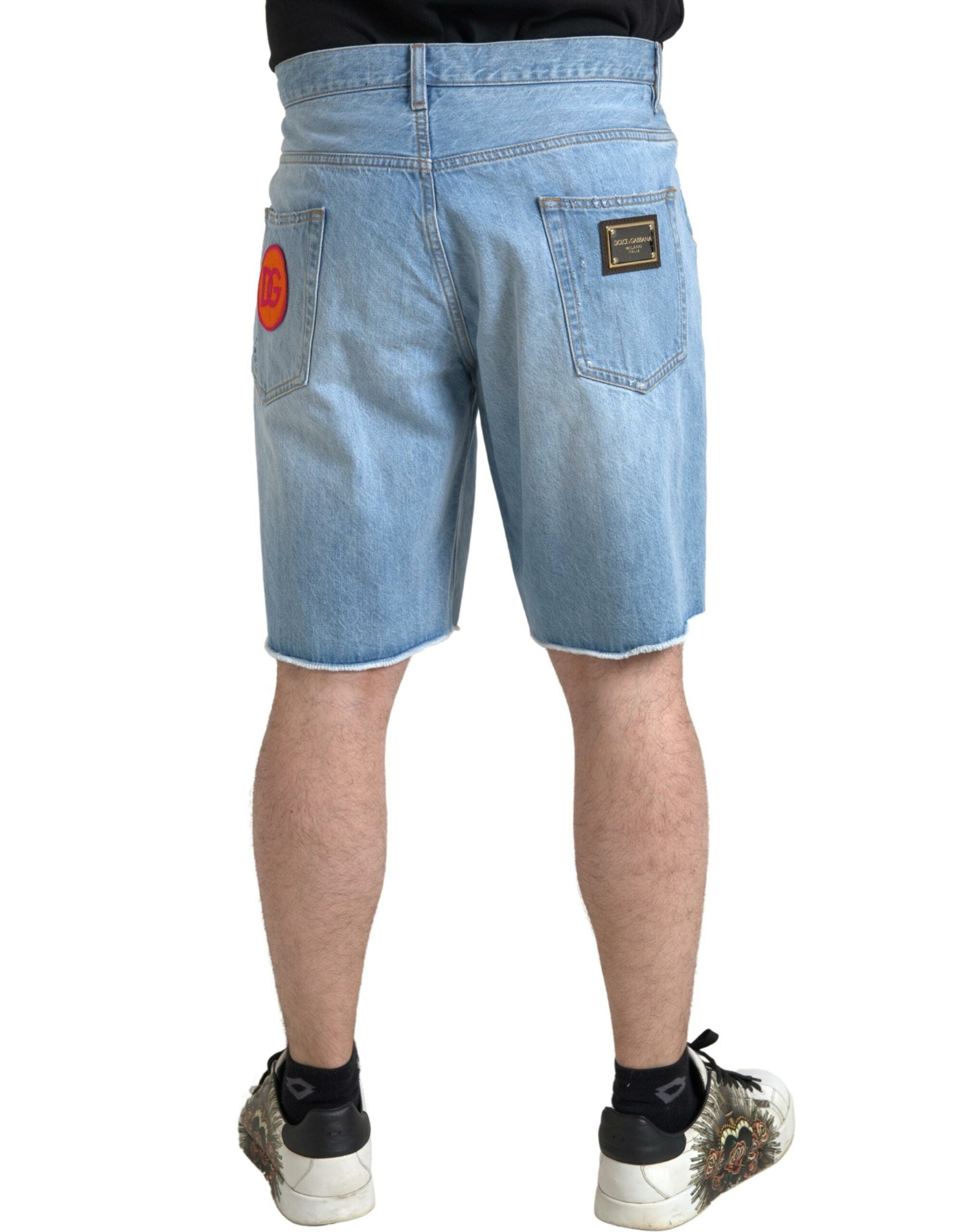 Light blue cotton denim men's Bermuda shorts by Dolce & Gabbana, showcasing a relaxed fit and classic style.