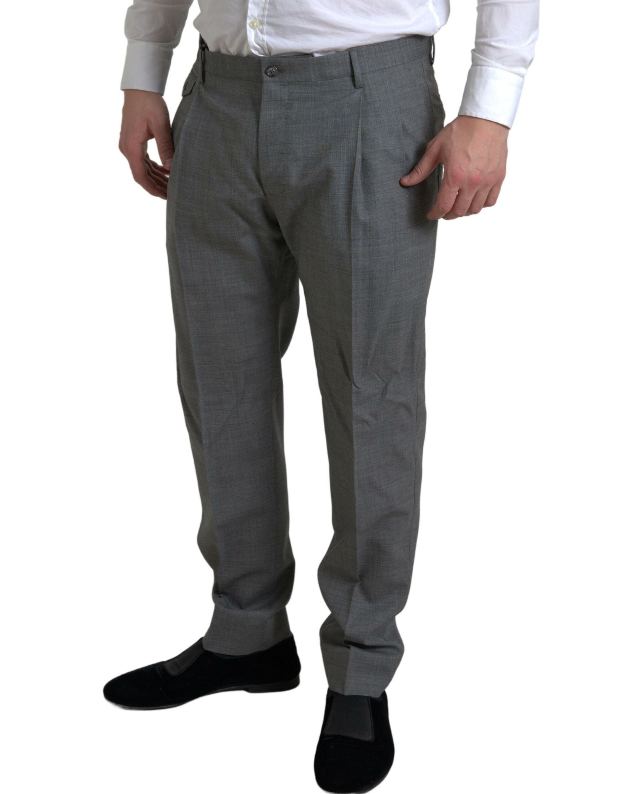 Gray wool chino skinny men's dress trousers by Dolce & Gabbana, shown on a hanger displaying tailored fit and smooth fabric.