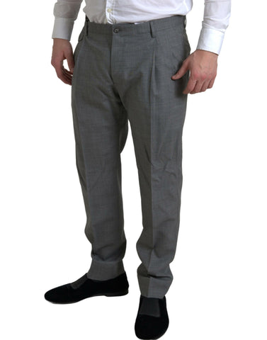 Gray wool chino skinny men's dress trousers by Dolce & Gabbana, shown on a hanger displaying tailored fit and smooth fabric.