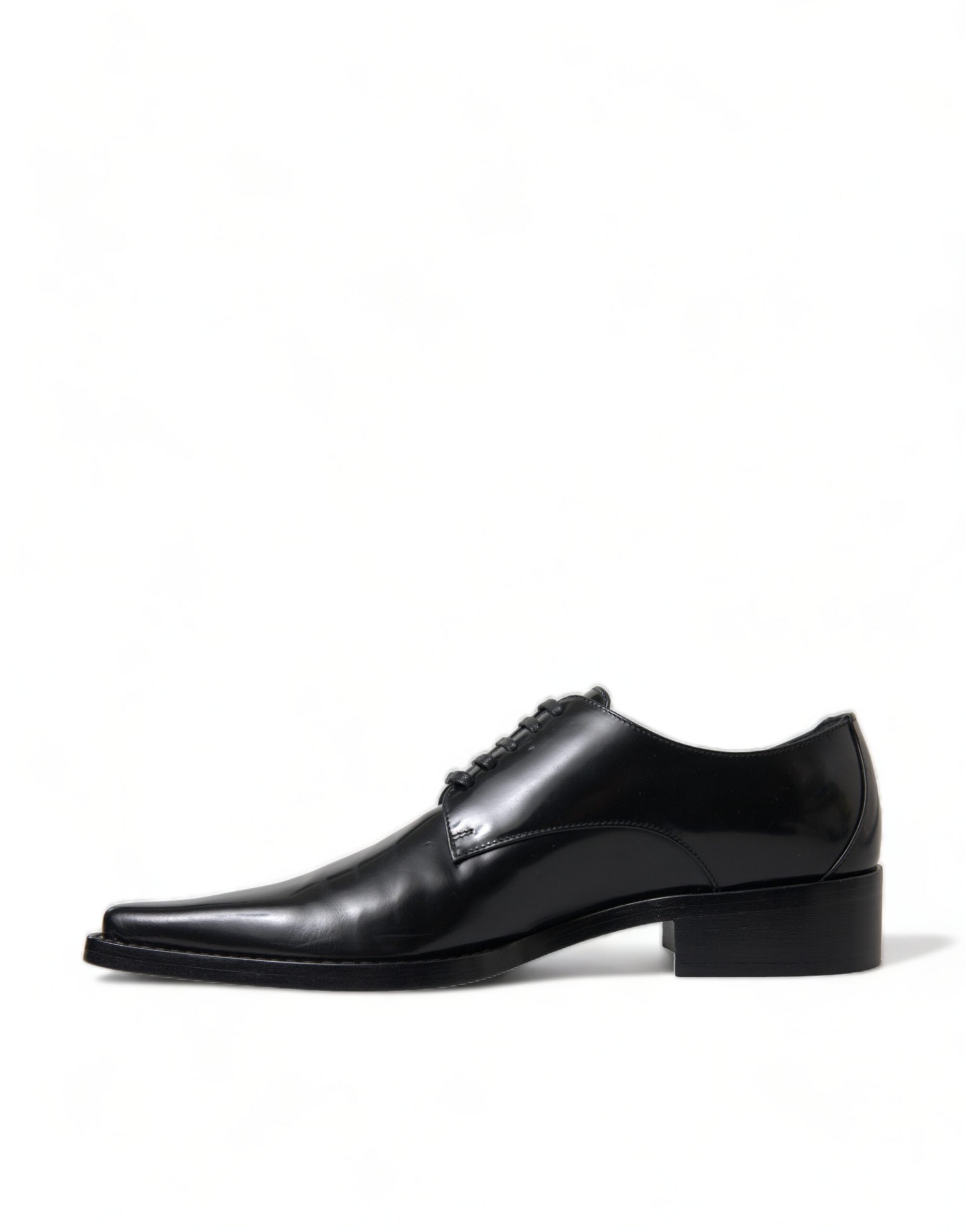 Black leather lace-up formal flats shoes by Dolce & Gabbana, featuring a sleek design and polished finish.