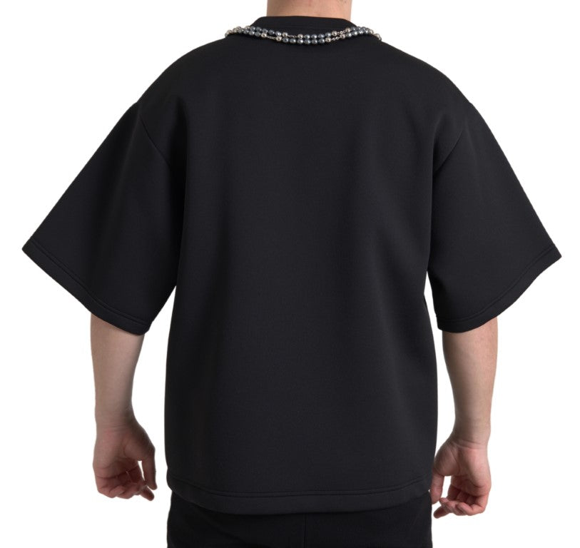 Black Dolce & Gabbana polyester T-shirt with embellished necklace detail, showcasing a stylish and modern casual look.