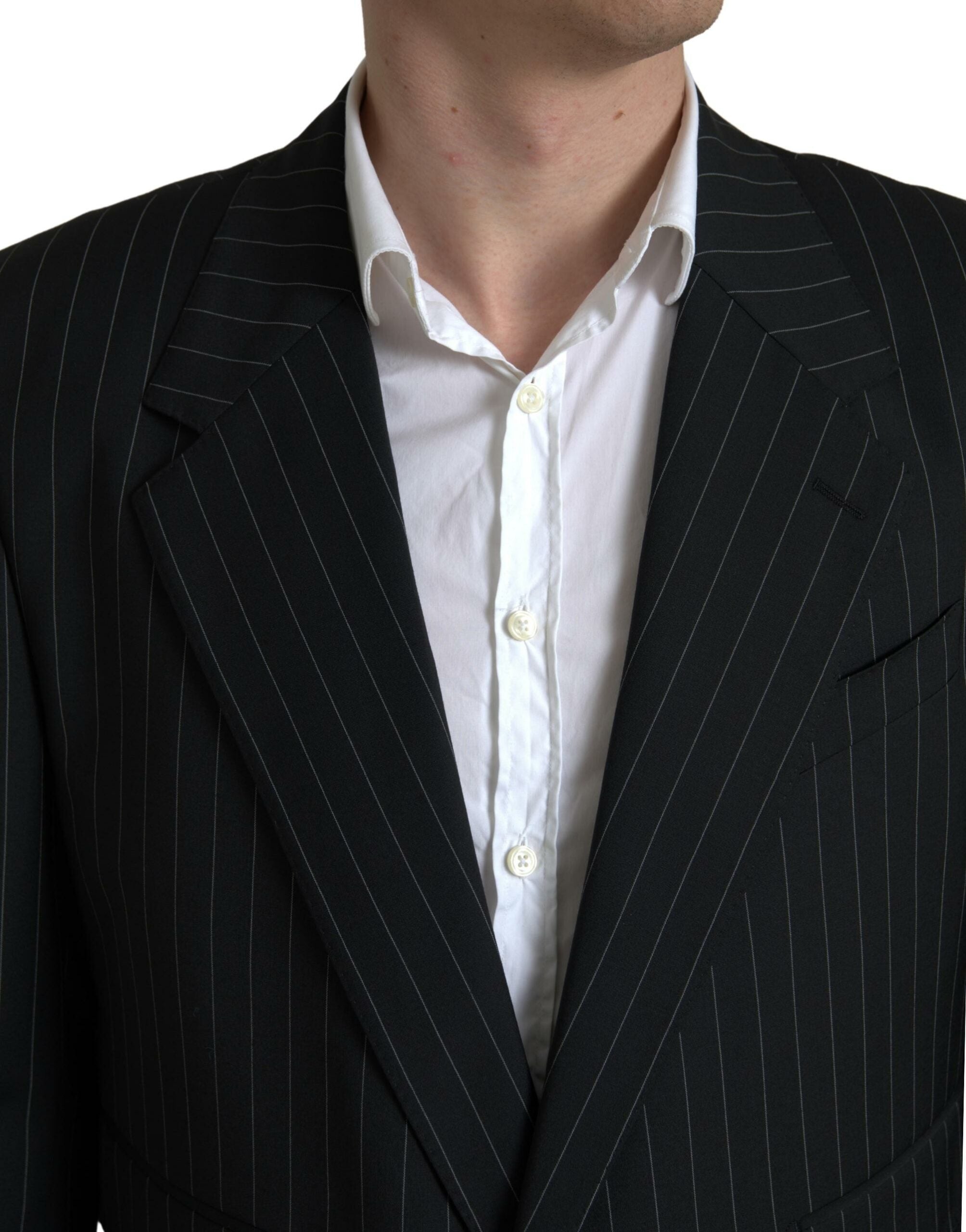 Black Dolce & Gabbana Sicilia blazer with white stripe, single-breasted design and tailored fit, displayed on a hanger.