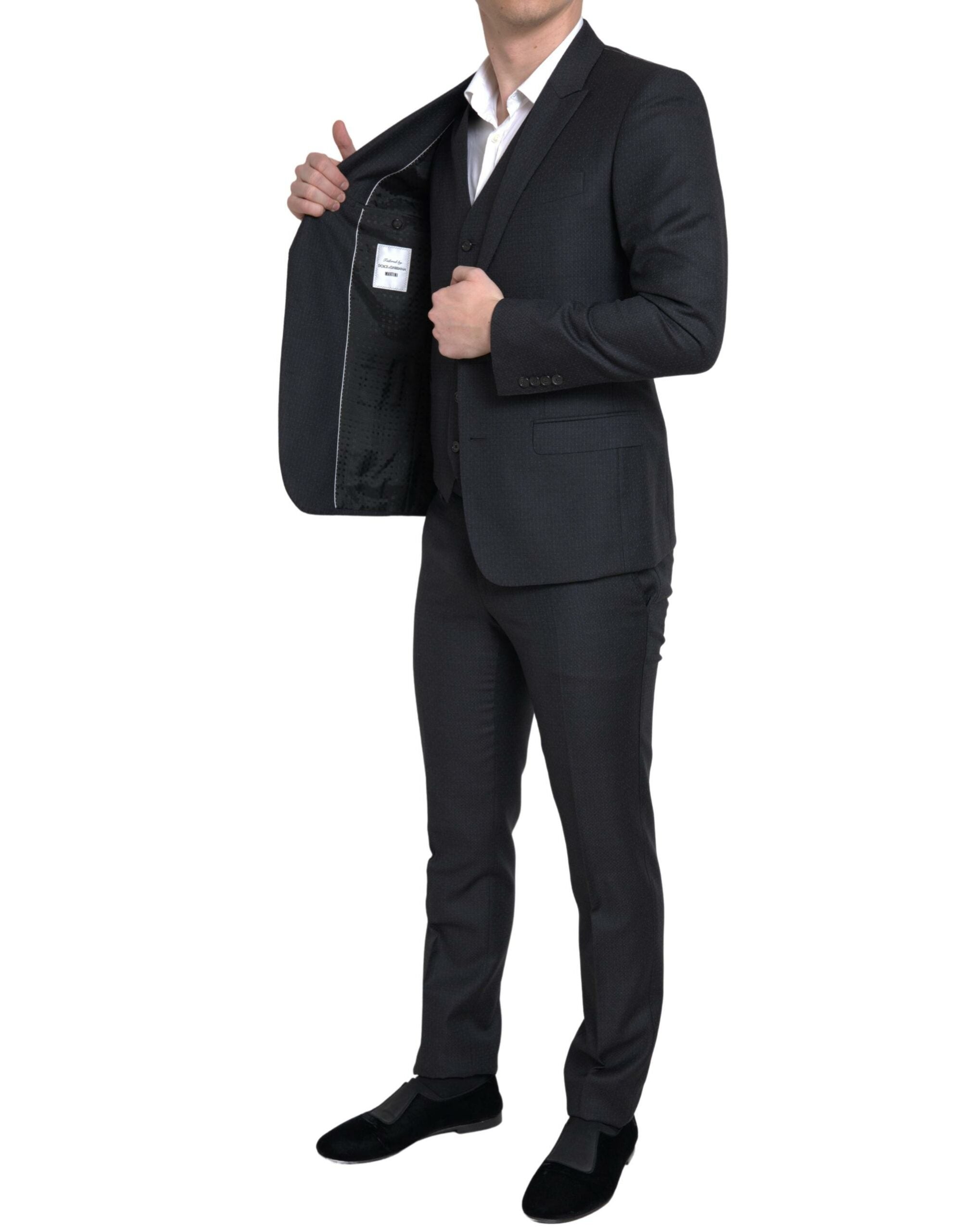 Black Dolce & Gabbana 3-piece Martini suit with single-breasted blazer and matching trousers, tailored fit for formal occasions.