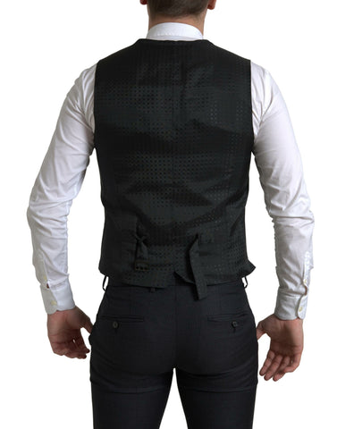Black 3-piece single-breasted Martini suit by Dolce & Gabbana, featuring tailored jacket, vest, and trousers on a mannequin.