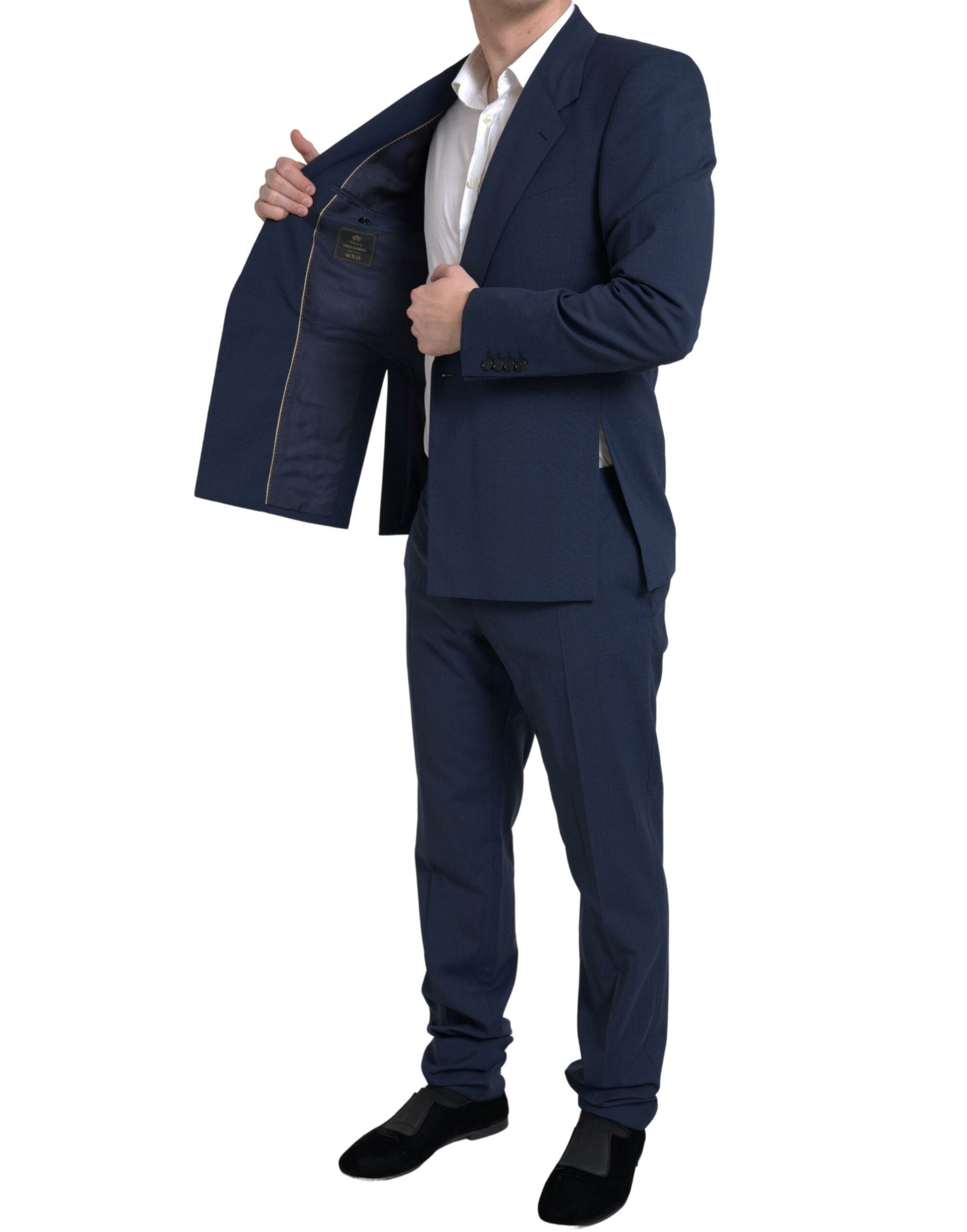 Blue Dolce & Gabbana Sicilia suit, 2-piece single-breasted men's formal suit, tailored fit with lapel collar, displayed on a hanger.