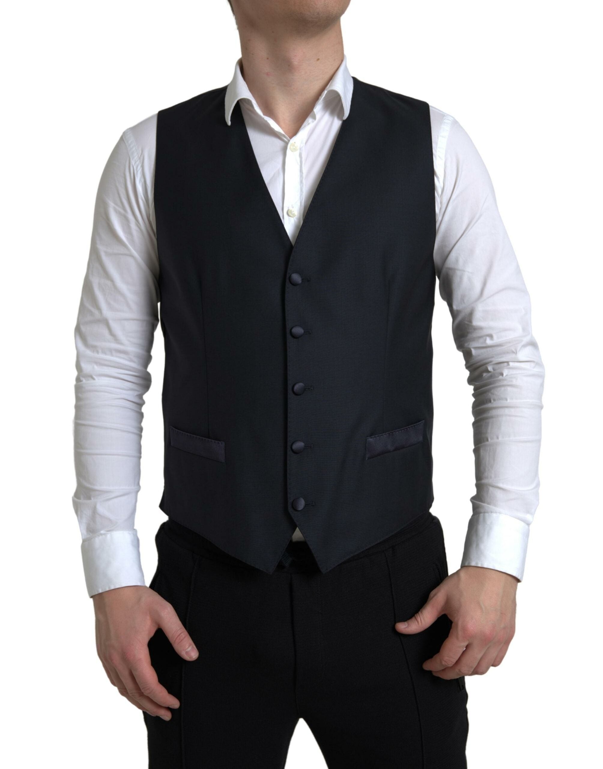 Blue 2-piece single-breasted Martini suit by Dolce & Gabbana, shown on a mannequin, featuring tailored lapels and classic fit.