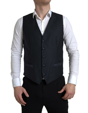 Blue 2-piece single-breasted Martini suit by Dolce & Gabbana, shown on a mannequin, featuring tailored lapels and classic fit.