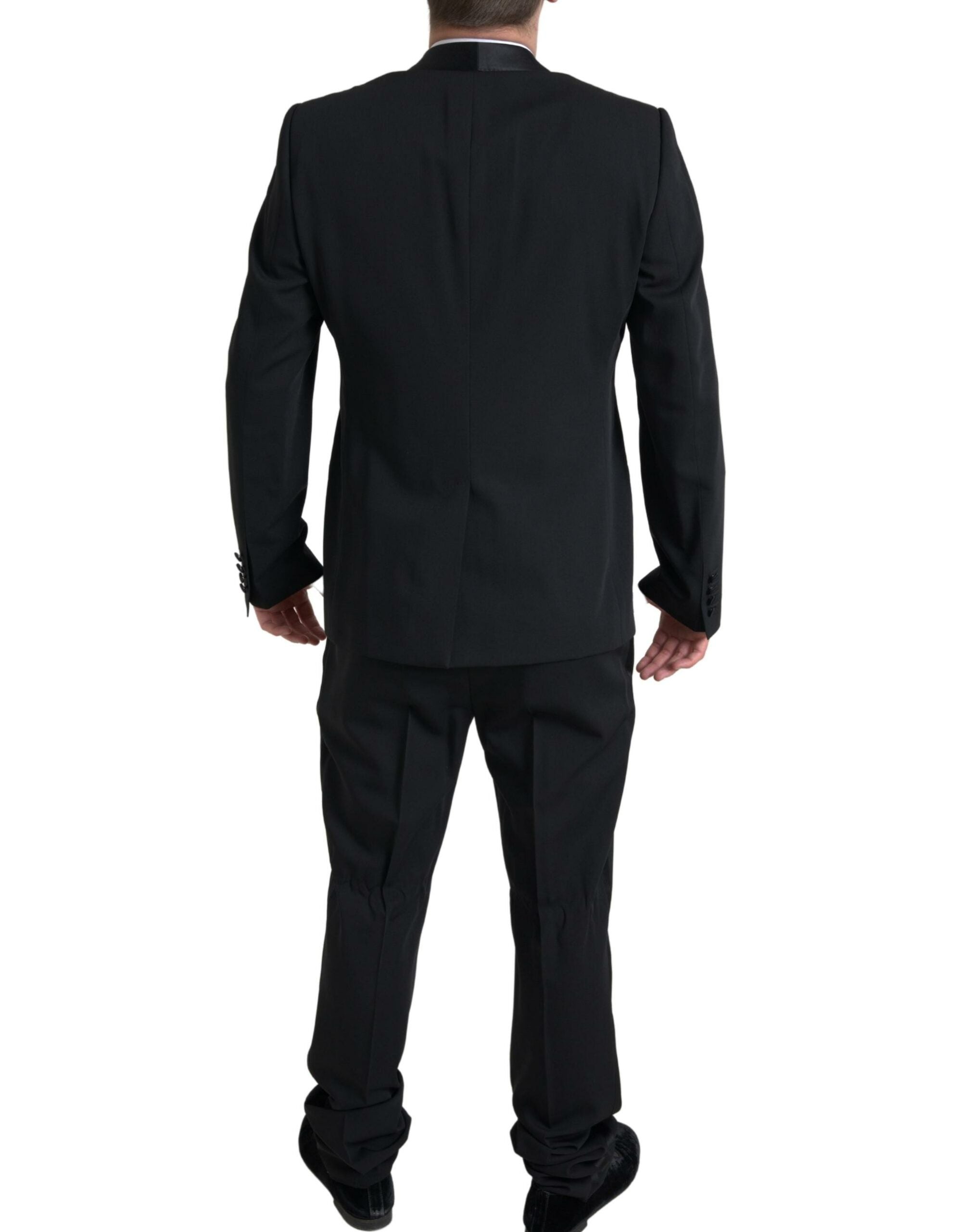 Black Dolce & Gabbana 2-piece single-breasted Martini suit, tailored with sharp lapels and sleek fabric for formal wear.