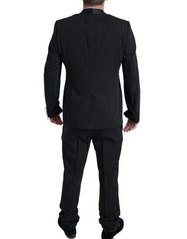 Black Dolce & Gabbana 2-piece single-breasted Martini suit, tailored with sharp lapels and sleek fabric for formal wear.