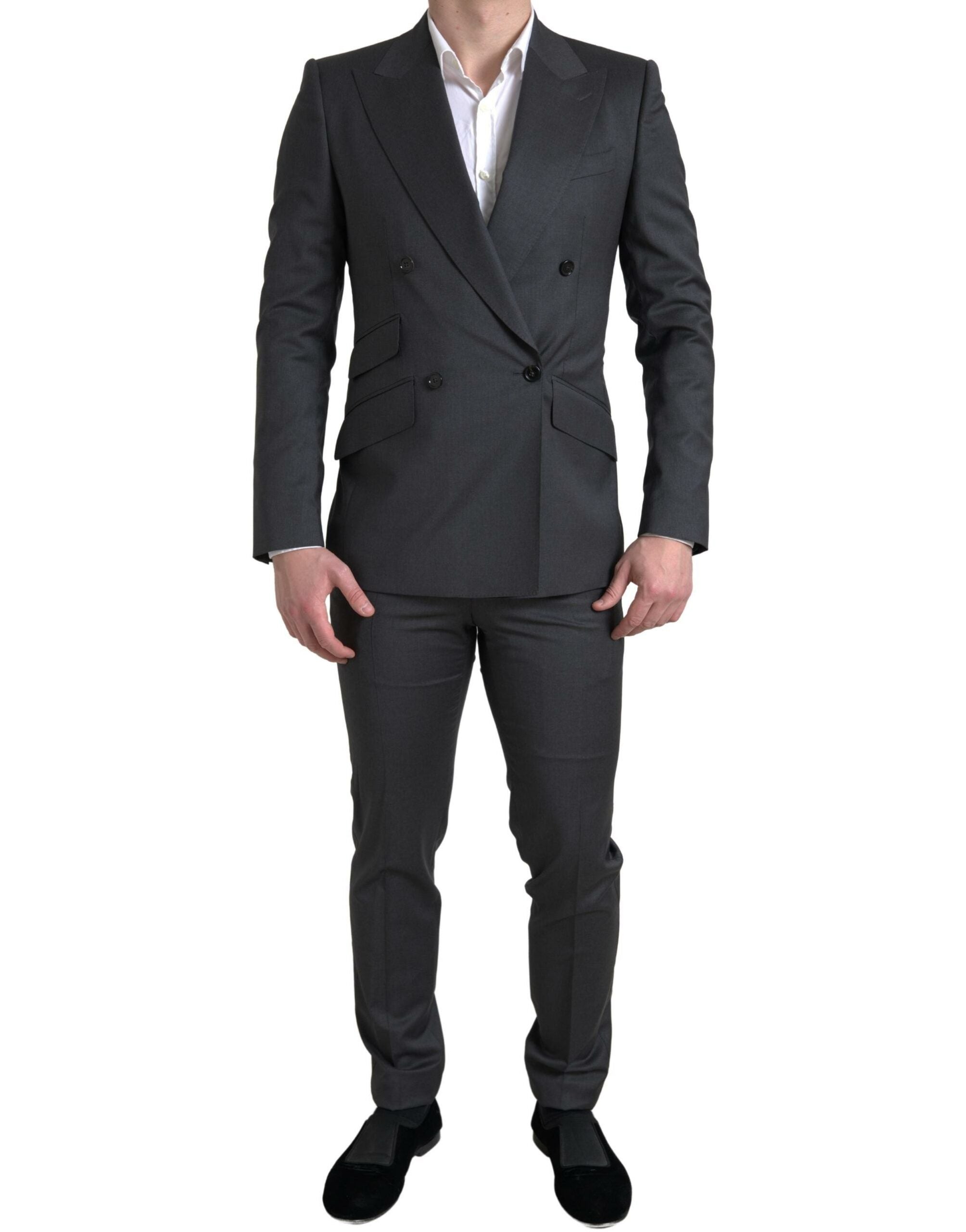 Gray Dolce & Gabbana Sicilia 2-piece double-breasted suit, tailored fit, with lapel collar and matching trousers on a mannequin.