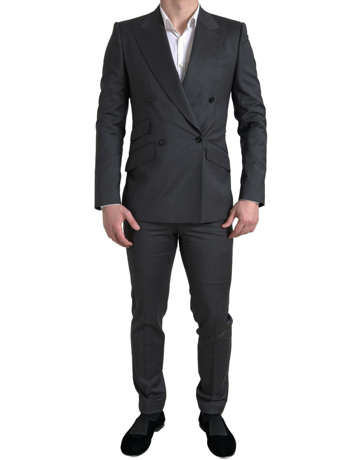 Gray Dolce & Gabbana Sicilia 2-piece double-breasted suit, tailored fit, with lapel collar and matching trousers on a mannequin.