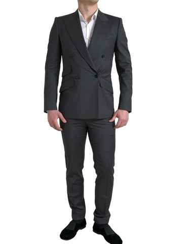 Gray Dolce & Gabbana Sicilia 2-piece double-breasted suit, tailored fit, with notch lapels and matching trousers, on a mannequin.