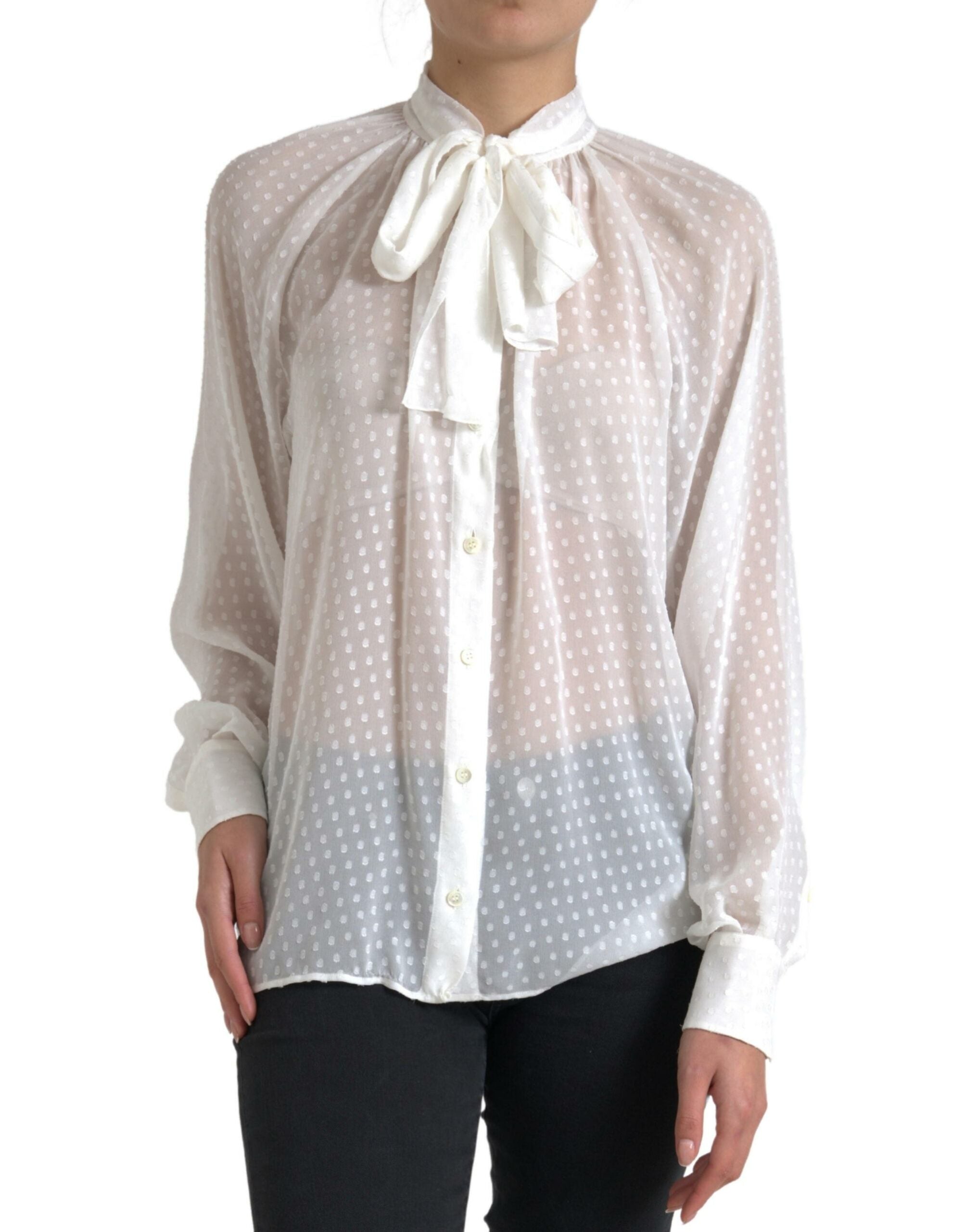 White silk sheer blouse with tied neck and polka dot pattern by Dolce & Gabbana, featuring a delicate and elegant design.