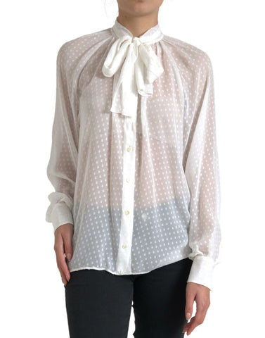 White silk sheer blouse with tied neck and polka dot pattern by Dolce & Gabbana, featuring a delicate and elegant design.