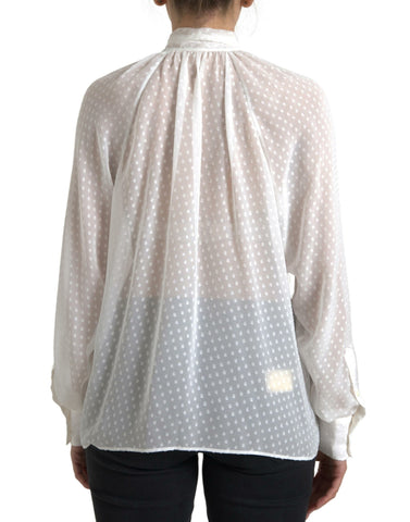White silk sheer blouse with tied neck and polka dot pattern by Dolce & Gabbana, featuring long sleeves and feminine style.