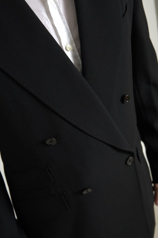 Black Dolce & Gabbana Sicilia 2-piece double-breasted suit, tailored jacket and matching trousers, styled for formal wear.