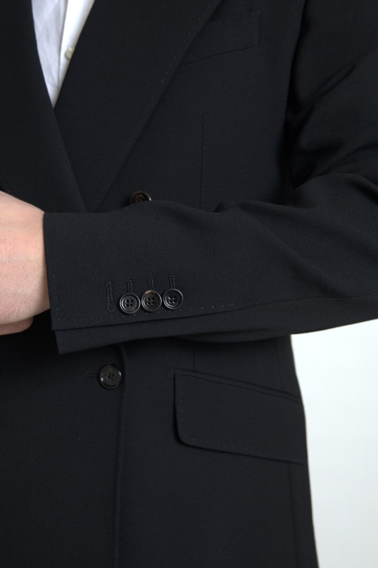 Black Dolce & Gabbana Sicilia 2-piece double-breasted suit, tailored blazer and matching trousers on a hanger.