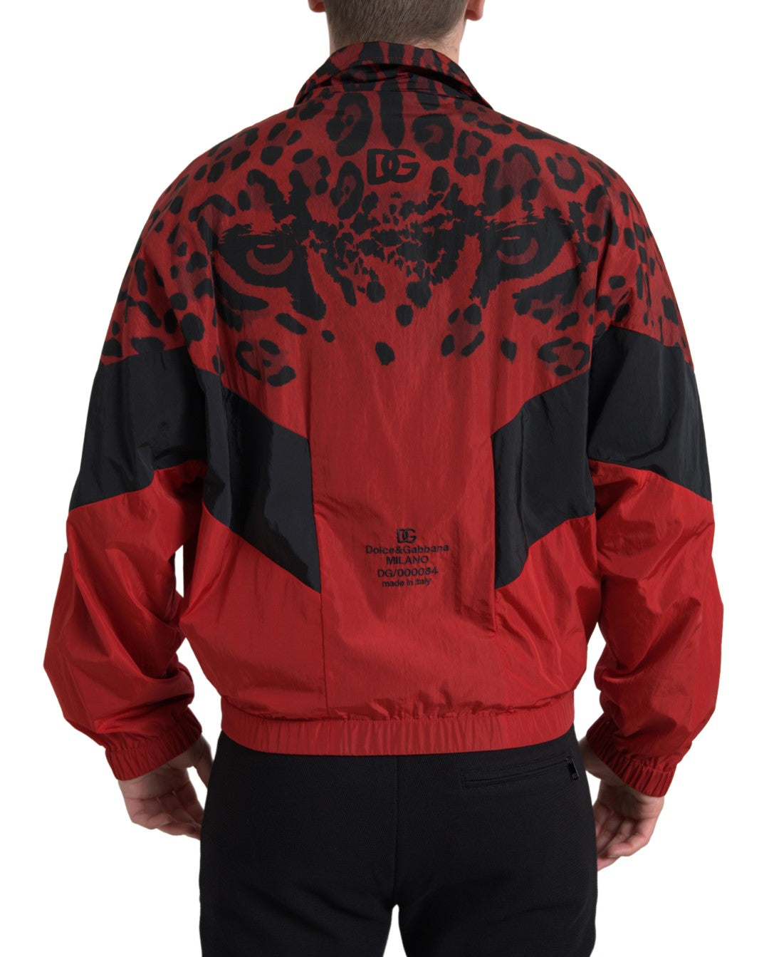 Red leopard print nylon full zip sweater by Dolce & Gabbana, featuring a stylish full-length zipper and vibrant pattern.
