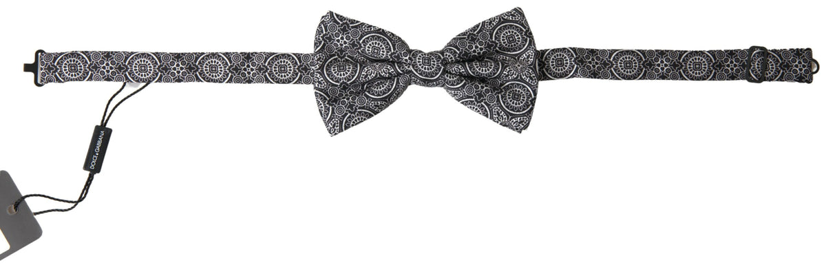 Black and white patterned adjustable neck bow tie by Dolce & Gabbana, featuring elegant papillon style and classic design.