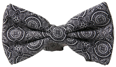 Black and white patterned adjustable neck bow tie from Dolce & Gabbana with classic papillon style.