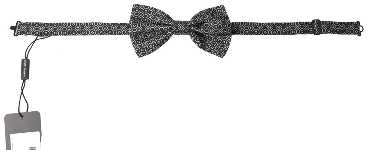 Black and white patterned adjustable neck bow tie by Dolce & Gabbana, featuring a classic papillon style with elegant design.