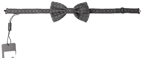 Black and white patterned adjustable neck bow tie by Dolce & Gabbana, featuring a classic papillon style with elegant design.