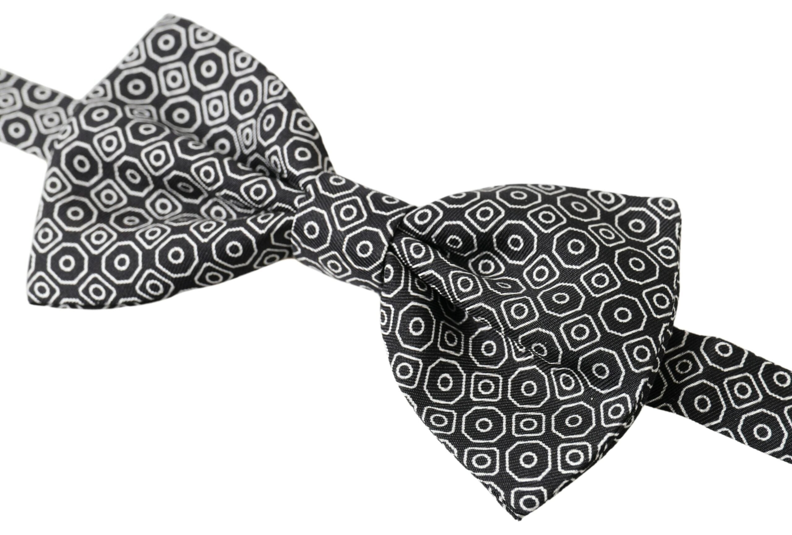 Black and white patterned adjustable neck bow tie by Dolce & Gabbana, featuring a classic papillon style with a stylish design.