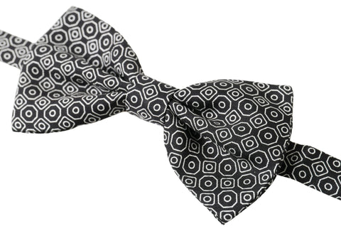 Black and white patterned adjustable neck bow tie by Dolce & Gabbana, featuring a classic papillon style with a stylish design.