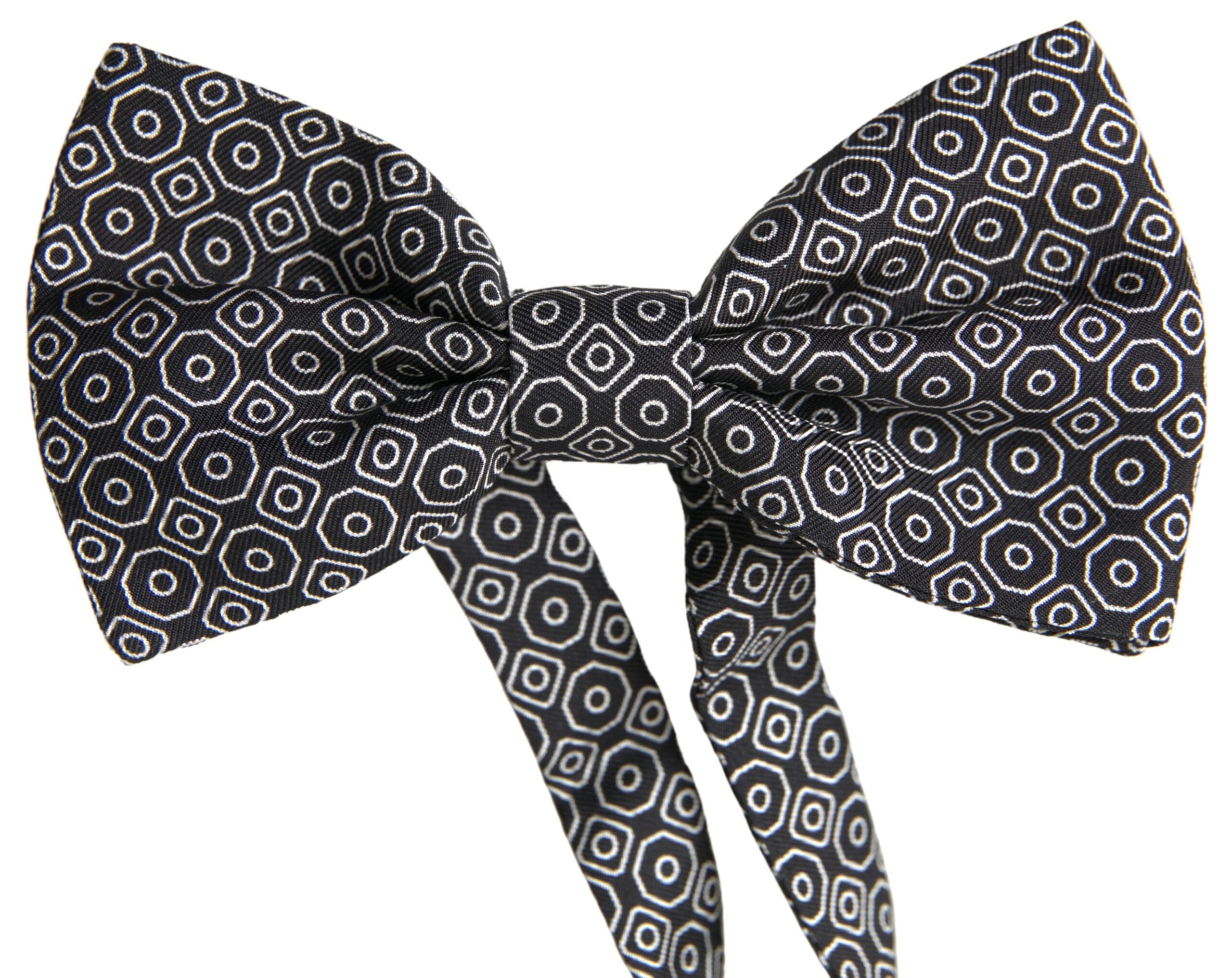 Black and white patterned adjustable neck bow tie by Dolce & Gabbana, featuring a stylish papillon design.