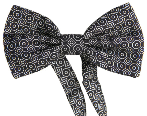 Black and white patterned adjustable neck bow tie by Dolce & Gabbana, featuring a stylish papillon design.