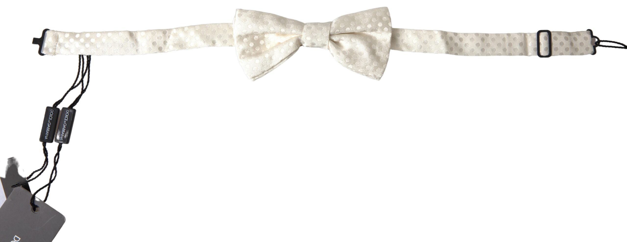 Ivory fantasy pattern adjustable neck papillon bow tie by Dolce & Gabbana, featuring a stylish and elegant design.