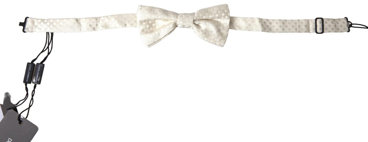 Ivory fantasy pattern adjustable neck papillon bow tie by Dolce & Gabbana, featuring a stylish and elegant design.