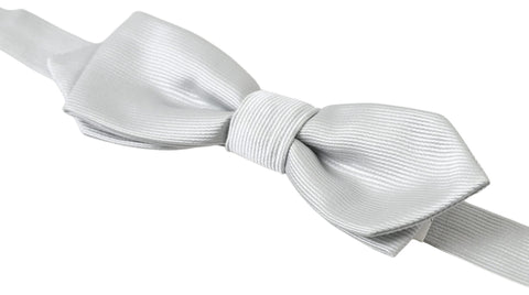 Gray silk adjustable men's neck bow tie with papillon style from Dolce & Gabbana, featuring a sleek, elegant design.
