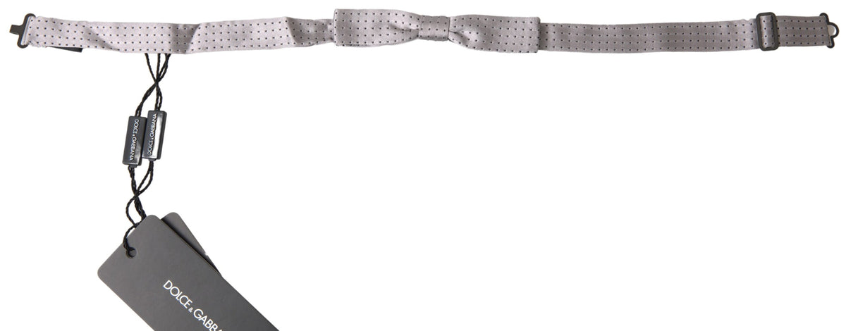 Gray dotted silk adjustable men's neck bow tie by Dolce & Gabbana, featuring a classic papillon style and elegant design.