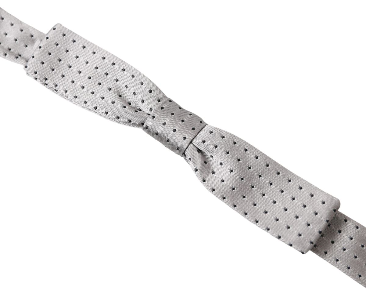 Gray dotted silk adjustable men's neck bow tie with papillon style from Dolce & Gabbana, featuring a classic and elegant design.