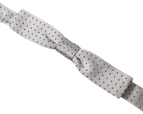 Gray dotted silk adjustable men's neck bow tie with papillon style from Dolce & Gabbana, featuring a classic and elegant design.