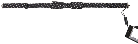 Black polka dot silk adjustable men's bow tie with a papillon style, designed by Dolce & Gabbana.