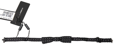 Black silk polka dot bow tie with adjustable strap for men, stylish neck accessory by Dolce & Gabbana