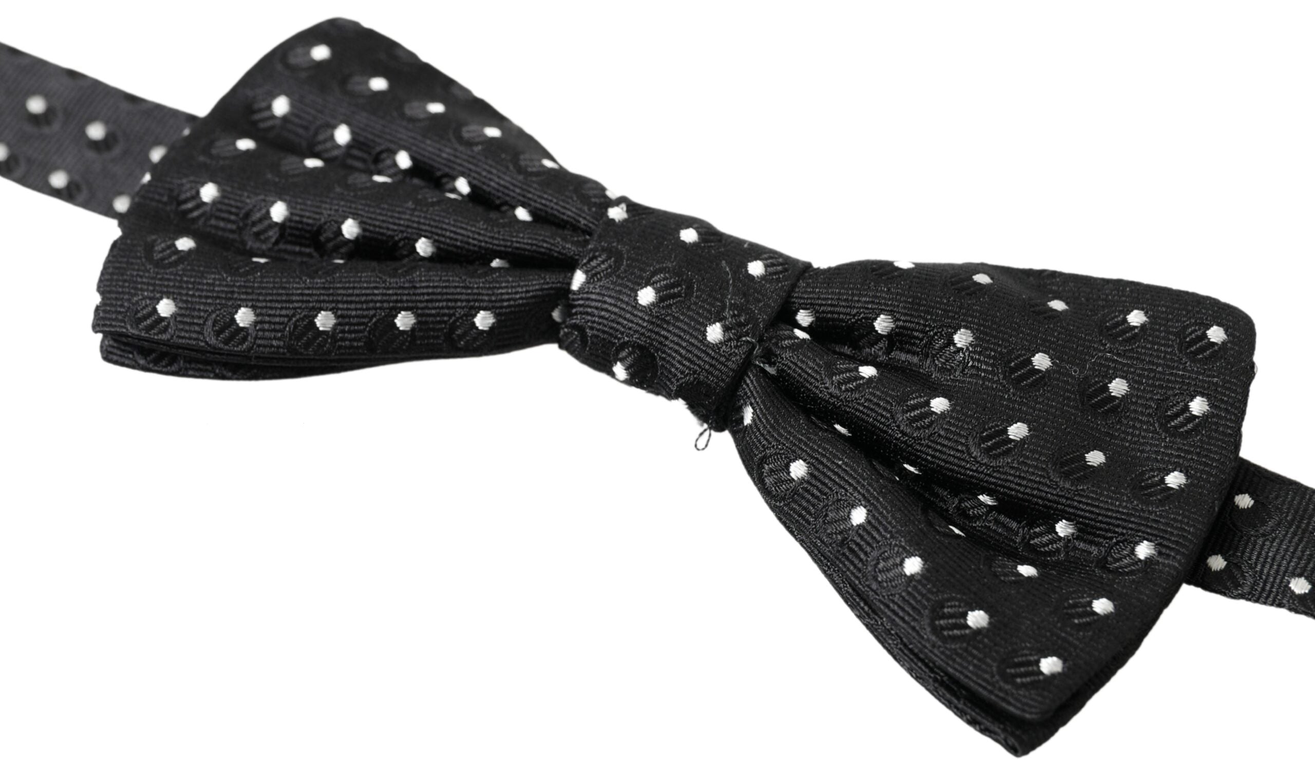 Black polka dot silk adjustable men's bow tie with a papillon style, crafted by Dolce & Gabbana.