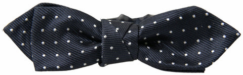 Blue polka dot silk adjustable men's bow tie with papillon style from Dolce & Gabbana, featuring a classic and elegant design.