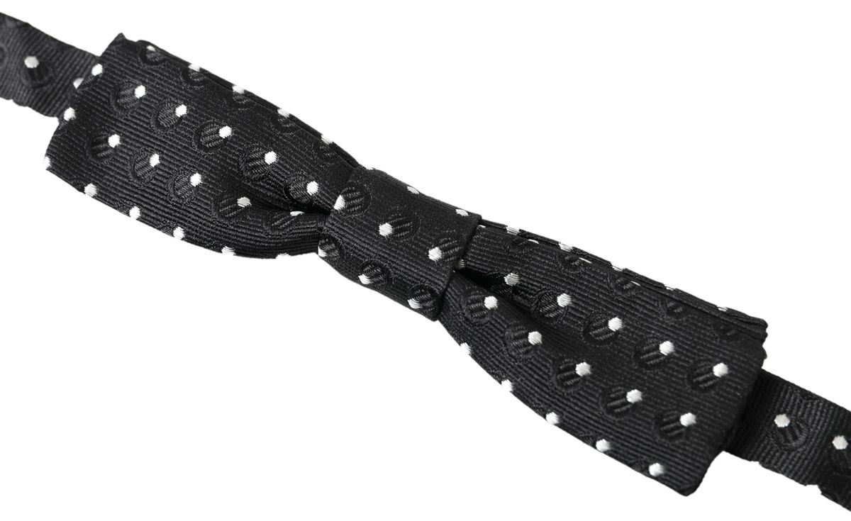Black silk polka dot men's bow tie with adjustable neck strap from Dolce & Gabbana.
