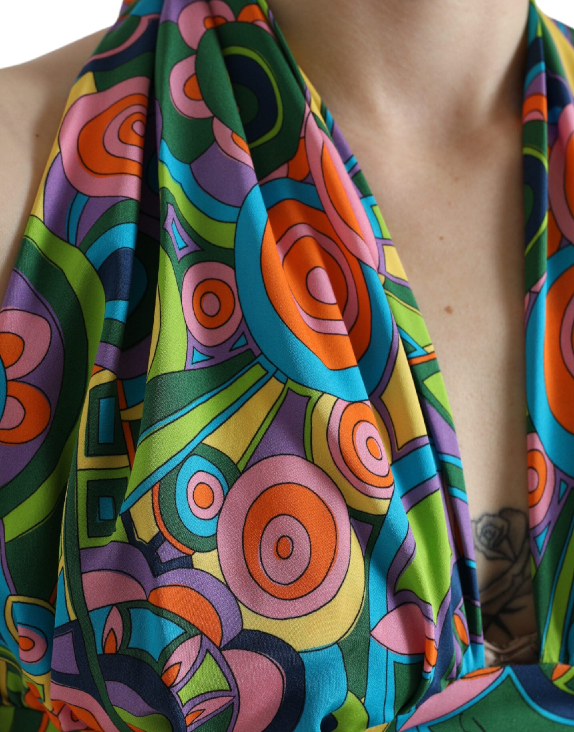 Multicolor halter sleeveless cropped tank top by Dolce & Gabbana with vibrant colors and stylish design.