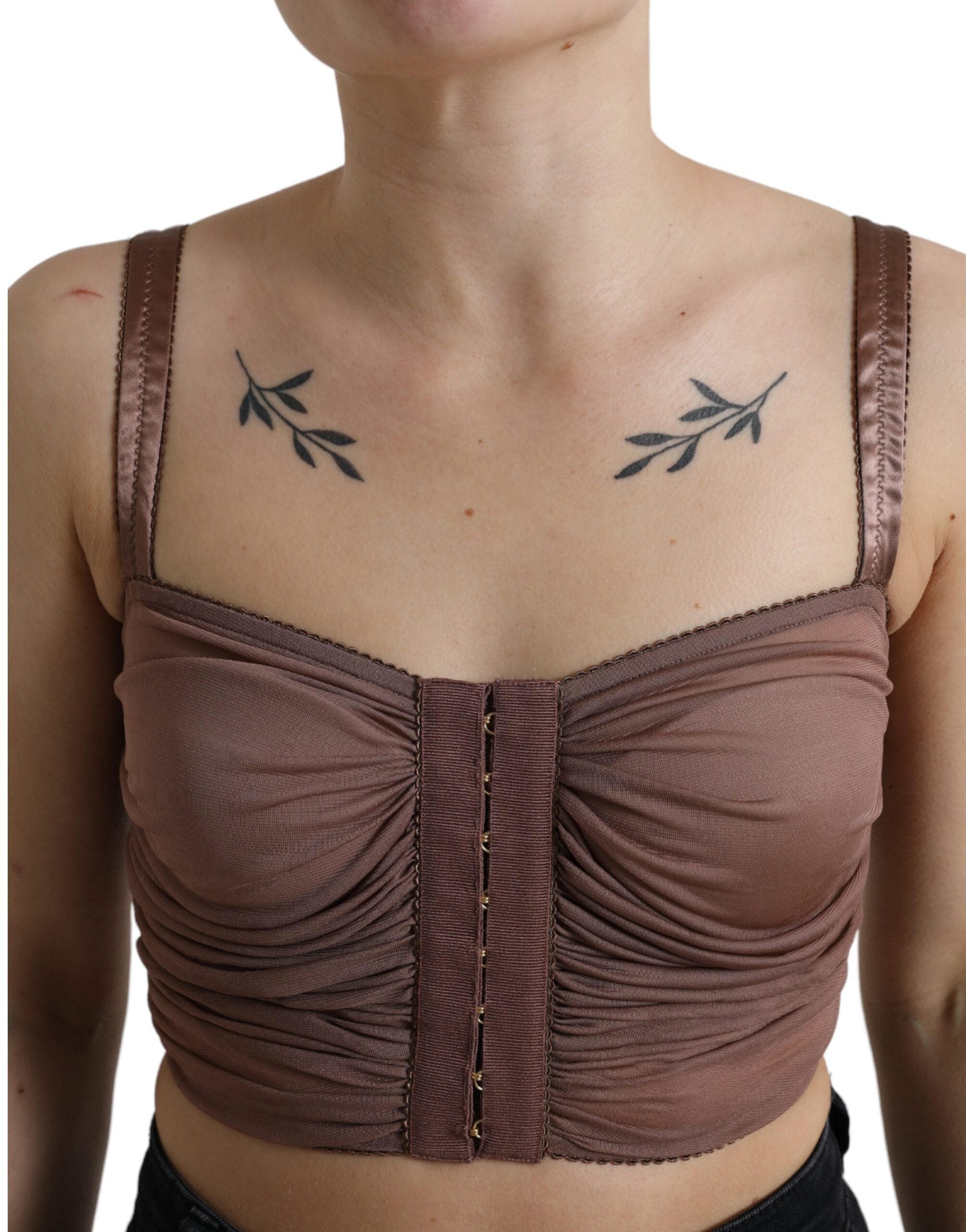 Brown viscose sleeveless bustier cropped top by Dolce & Gabbana, close-up of fitted design and smooth fabric texture.