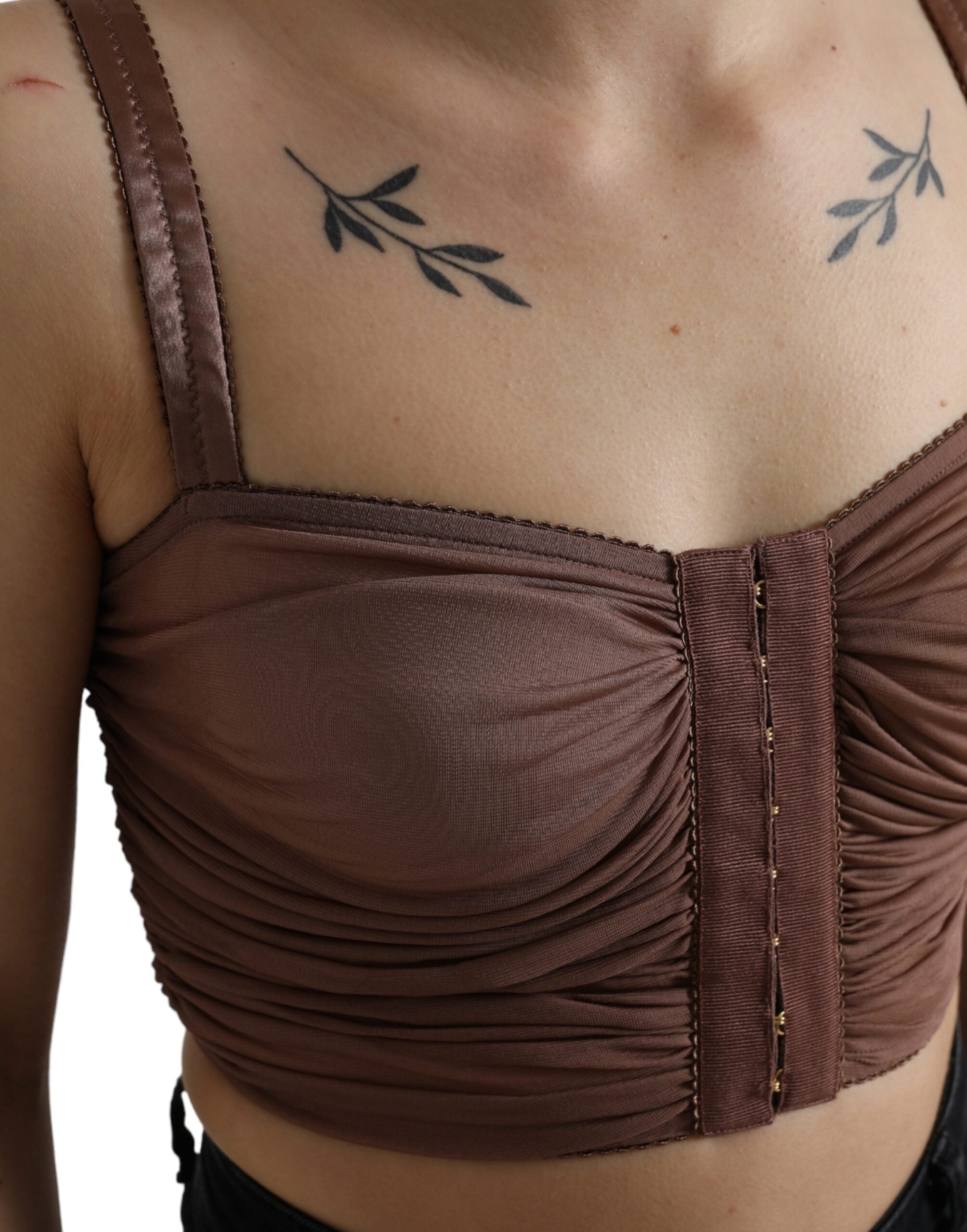 Brown viscose bustier sleeveless cropped top by Dolce & Gabbana, shown with fitted design and structured neckline.