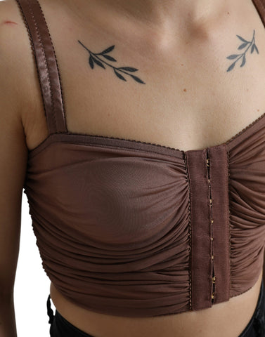 Brown viscose bustier sleeveless cropped top by Dolce & Gabbana, shown with fitted design and structured neckline.