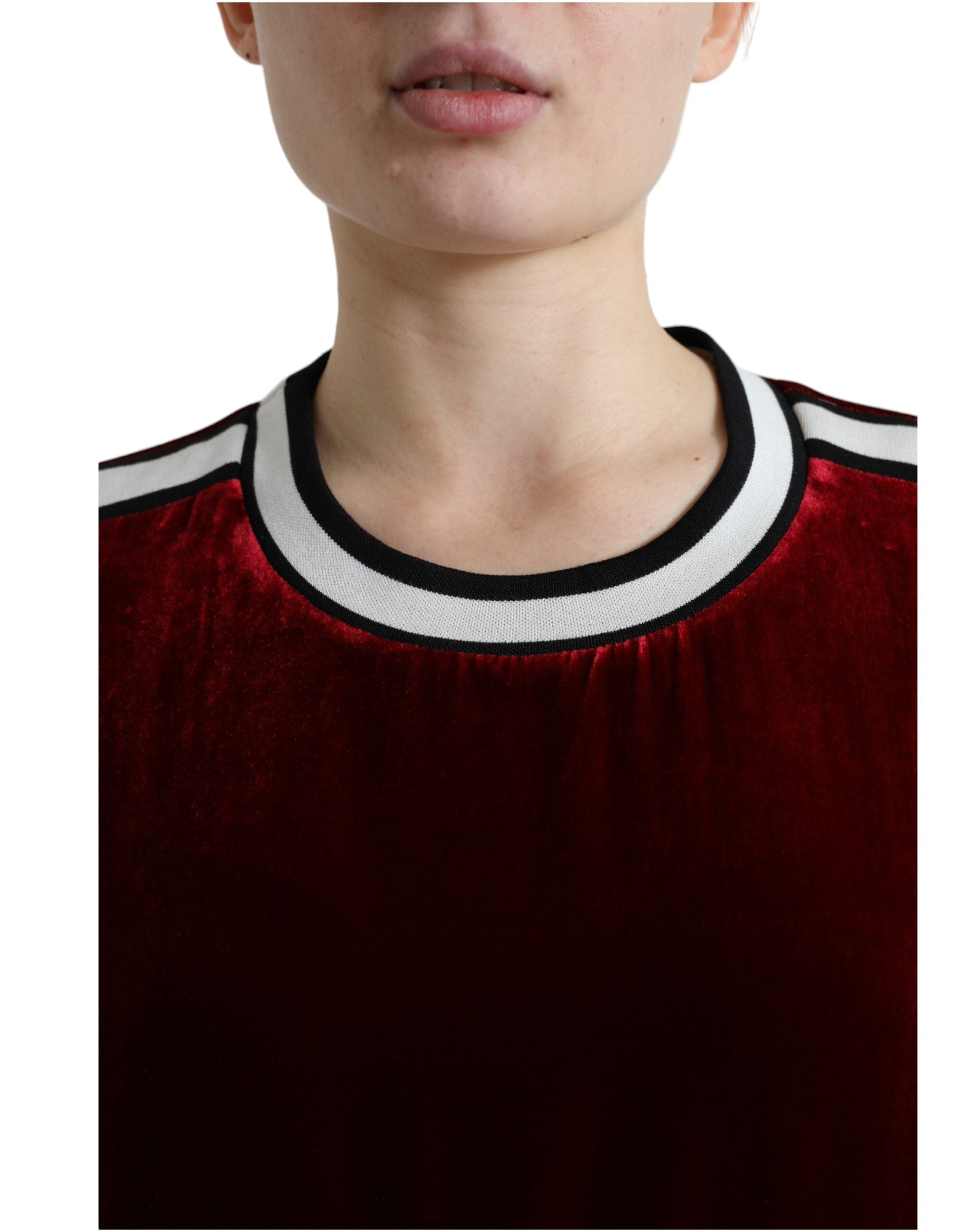 Dolce & Gabbana Bordeaux velvet crew neck pullover sweater displayed on a hanger.