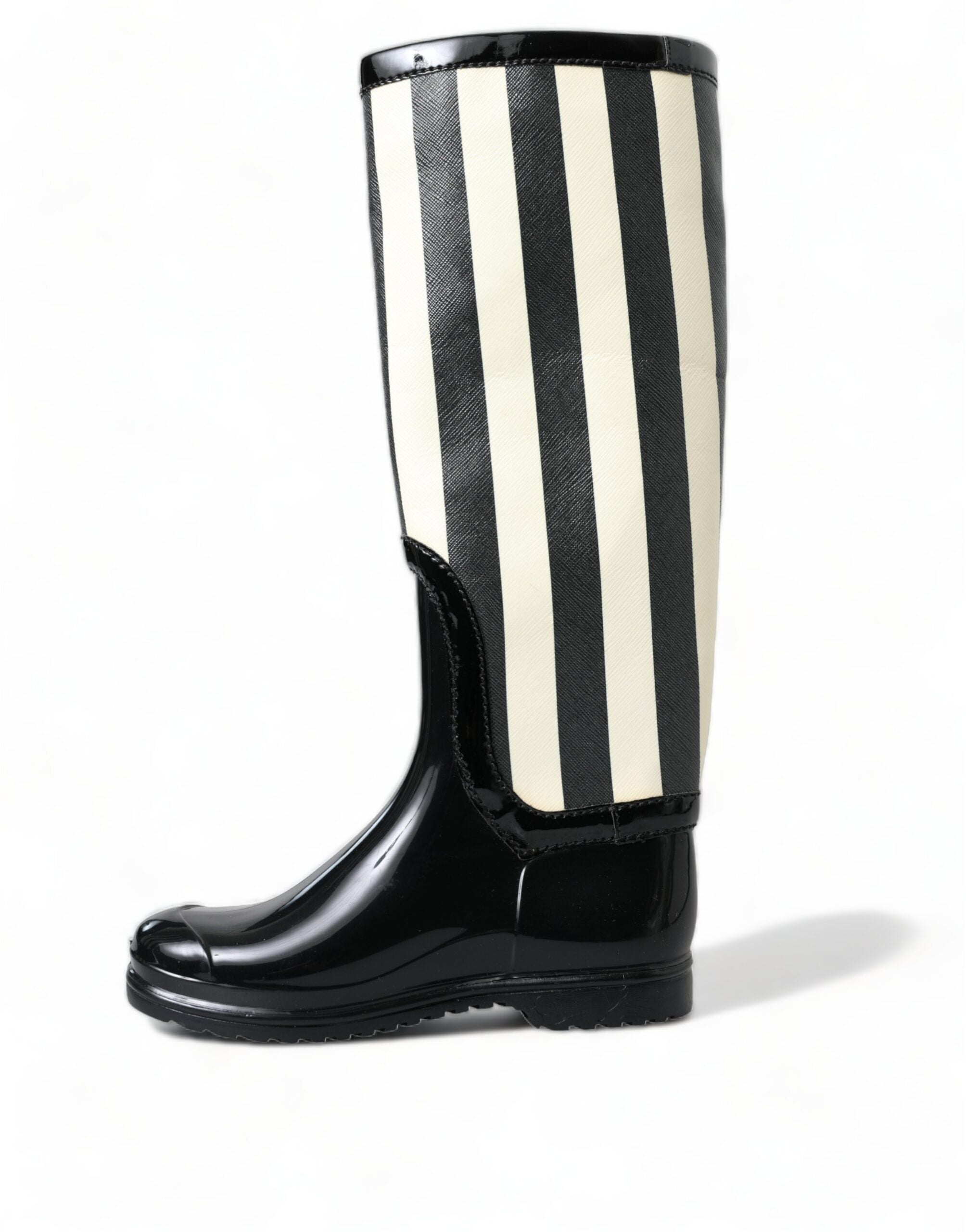 Black rubber knee-high flat boots by Dolce & Gabbana, stylish footwear with a sleek design and flat sole.